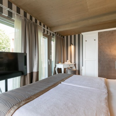 Suite con maxi schermo tv hotel trento